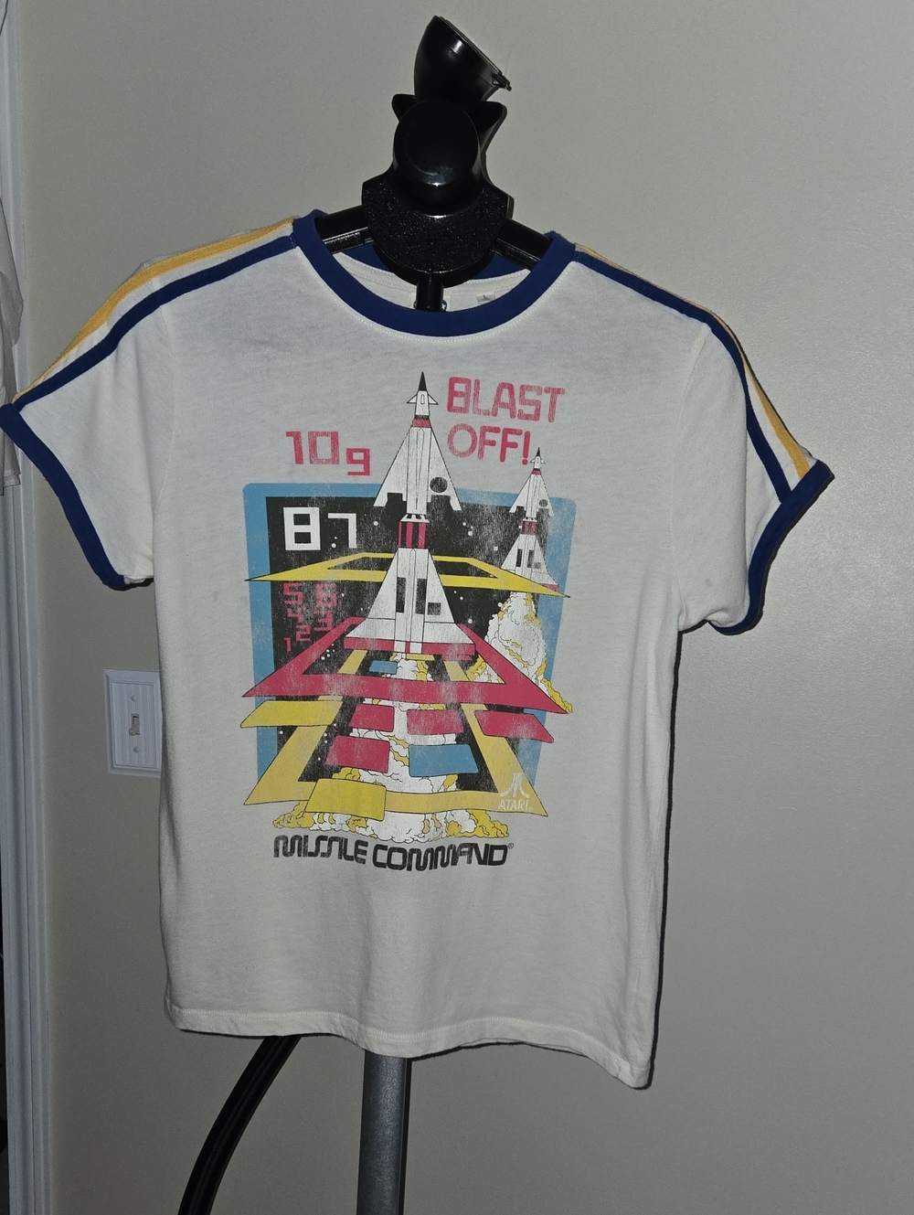Junk Food Clothing White 'Blast Off' Graphic Tee with Blue And Yellow  Trim